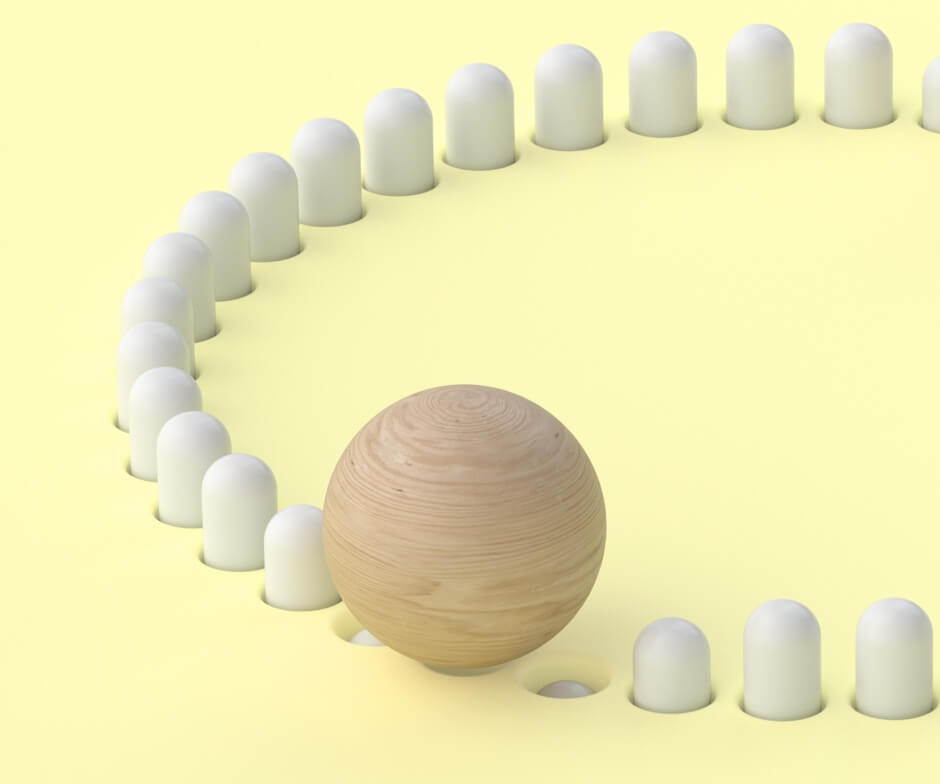 Wooden ball aligned with white pegs to form a circle on a yellow background