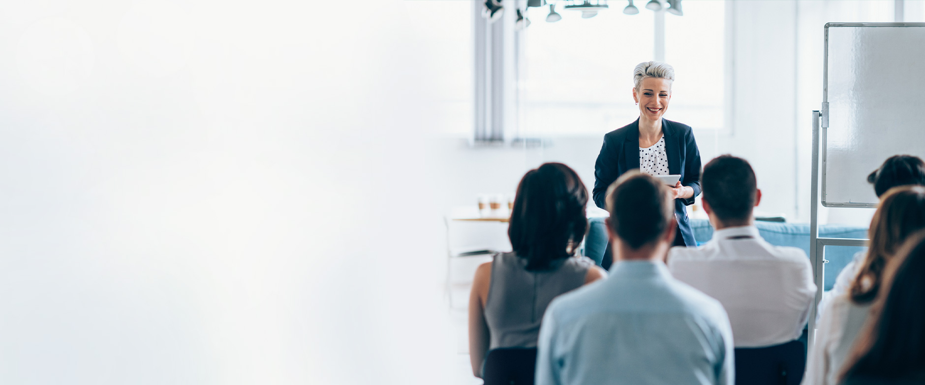 Presenter in front of a learning session