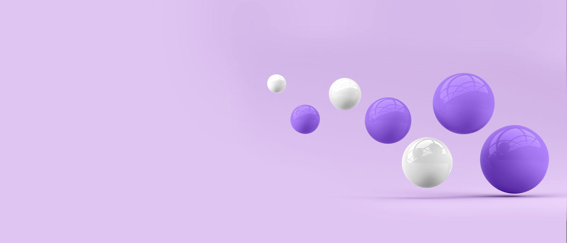 purple and white balls in box