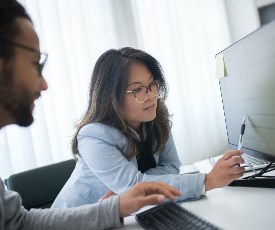 Woman analyzing data on computer