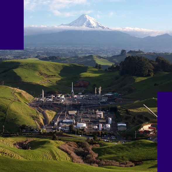 A landscape photo of an energy plant in the middle of a valley